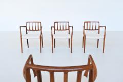  J L Mollers Mobelfabrik Niels Otto Moller armchairs 66 in rosewood and boucl Denmark 1974 - 4021291