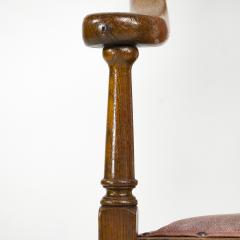  J S Henry J S Henry An ash Arts Crafts armchair with an elongated back curled ears - 4183303