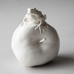  Jean Paul Gourdon SCULPTURE OF A SMALL FROG SITTING ATOP AN APPLE IN GLAZED WHITE FA ENCE - 3779409