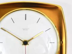  Junghans Uhren GmbH Elegant Mid Century Junghans Ato Mat Gold Brass Wall Clock Germany 1950s - 4057655