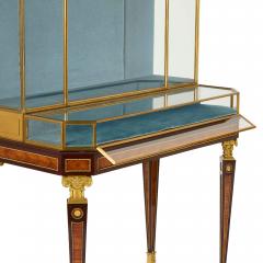  L Escalier de Cristal Pair of antique ormolu mounted vitrine cabinets by LEscalier de Cristal - 4136394