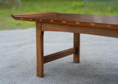  Lane Furniture Uncommon Lane Architectural Walnut Coffee Table with Upturned Ends Cane Shelf - 4232437