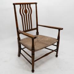  Liberty Co Liberty Co An Arts Crafts Rush Seat Armchair - 4185539