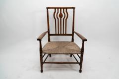  Liberty Co Liberty Co An Arts Crafts Rush Seat Armchair - 4185541