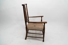  Liberty Co Liberty Co An Arts Crafts Rush Seat Armchair - 4185542