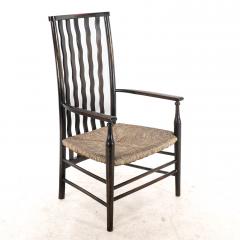  Liberty Co Liberty Co An Arts Crafts Rush Seat Armchair with Wavy Shaped Back Slats - 4185557