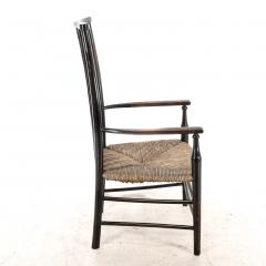  Liberty Co Liberty Co An Arts Crafts Rush Seat Armchair with Wavy Shaped Back Slats - 4185560
