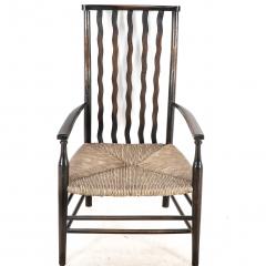  Liberty Co Liberty Co An Arts Crafts Rush Seat Armchair with Wavy Shaped Back Slats - 4185562