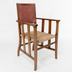  Liberty Co Liberty Co An Arts Crafts Rush Seat Armchair with a Shaped Back - 4185550