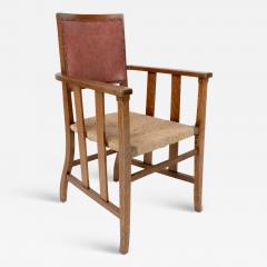  Liberty Co Liberty Co An Arts Crafts Rush Seat Armchair with a Shaped Back - 4232929