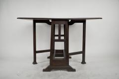 Liberty Co Liberty Co attributed A Good Quality Arts Crafts Oak Drop leaf Table - 4191968