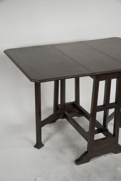  Liberty Co Liberty Co attributed A Good Quality Arts Crafts Oak Drop leaf Table - 4191970