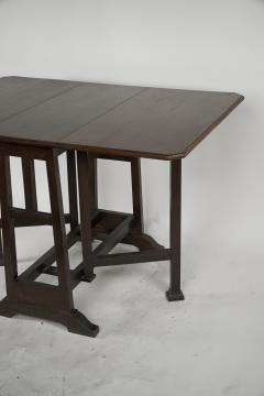  Liberty Co Liberty Co attributed A Good Quality Arts Crafts Oak Drop leaf Table - 4191971