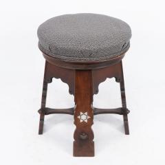  Liberty Co Liberty and Co attri A rare Moorish walnut revolving stool with Moorish arches - 4192040