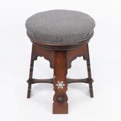  Liberty Co Liberty and Co attri A rare Moorish walnut revolving stool with Moorish arches - 4192042