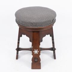  Liberty Co Liberty and Co attri A rare Moorish walnut revolving stool with Moorish arches - 4192044