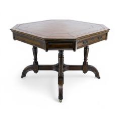  MAPLE Co Maple Co a Gothic Revival Oak Leather Top Writing Table on Decorative Castors - 4185720