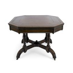  MAPLE Co Maple Co a Gothic Revival Oak Leather Top Writing Table on Decorative Castors - 4185721