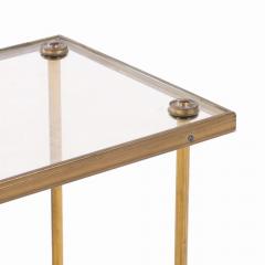  Maison Bagu s A French brass and glass tiered table in the manner of Bagues C 1950  - 4211262