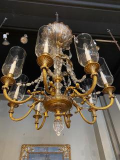  Maison Bagu s FINE GILT BRONZE AND CRYSTAL GLASS CHANDELIER BY MAISON BAGU S - 3023856