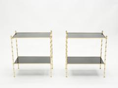  Maison Bagu s Pair of French Maison Bagu s bamboo brass black top two tier end tables 1960s - 1837061