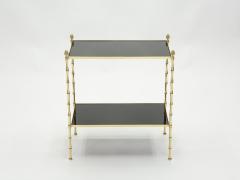  Maison Bagu s Pair of French Maison Bagu s bamboo brass black top two tier end tables 1960s - 1837064