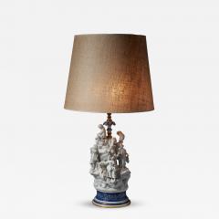  Mangani Porcelain Table Lamp with Sculpted Figurines - 4515063
