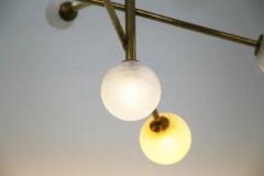  Midcentury Italian school Italian Ceiling Chandelier in Glass and Brass Contemporary - 3704010