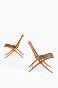  Peter Hvidt Orla M lgaard Nielsen Pair of Easy Chairs in Beech Rattan by Peter Hvidt Orla M lgaard Nielsen 1959 - 4736461