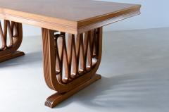  Pierluigi Colli Extraordinary oak table with shaped uprights and ribbon motif - 3074441