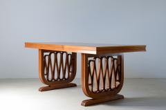  Pierluigi Colli Extraordinary oak table with shaped uprights and ribbon motif - 3074452