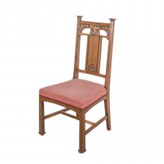  Robson Sons Robson Sons Set of 4 Arts Crafts oak dining chairs with carved floral backs - 4185860
