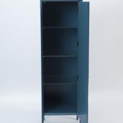  Roche Bobois A Roche Bobois painted blue wood cabinet having a single textured laminate door  - 2683697