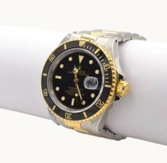  Rolex Watch Co Rolex Two Tone Submariner Wristwatch in 18K Gold and Steel Ref 16803 Circa 1985 - 4447739