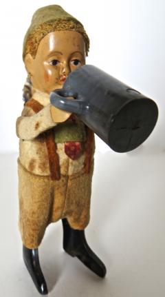  Schuco Company Schuco Clockwork Dancing Boy with a Beer Mug Germany Circa 1940 - 414877