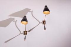  Stilnovo A pair of wall light made of brass and painted metal Italy 1950s - 3485255