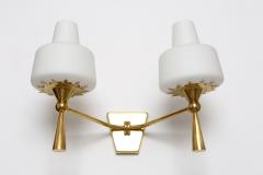  Stilnovo Pair of wall lamps in the style of Maison Lunel - 732547