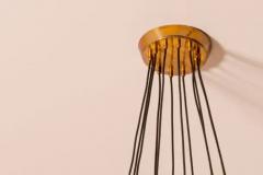  Stilnovo Stilnovo large painted metal and brass twelve arm chandelier italy 1950s - 3696536