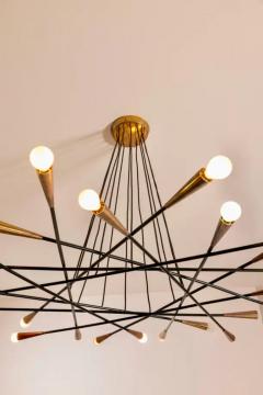  Stilnovo Stilnovo large painted metal and brass twelve arm chandelier italy 1950s - 3696540