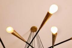  Stilnovo Stilnovo large painted metal and brass twelve arm chandelier italy 1950s - 3696544