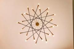  Stilnovo Stilnovo large painted metal and brass twelve arm chandelier italy 1950s - 3696545