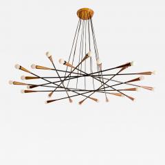  Stilnovo Stilnovo large painted metal and brass twelve arm chandelier italy 1950s - 3699297