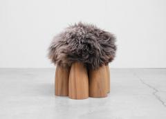  Studio Arno Declercq STUDIO ARNO DECLERCQ SENUFO OTTOMAN IN NATURAL AFRICAN WALNUT AND SHEEPSKIN - 2069339