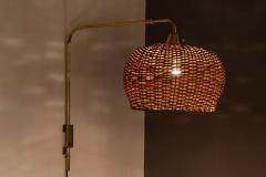  Taito Oy Rare 1950s Paavo Tynell Articulating Brass and Wicker Wall Light for Taito Oy - 912219