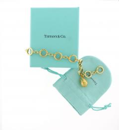  Tiffany Co Tiffany Co 18k Yellow Gold Charm Bracelet with Diamond Egg Locket - 4239694