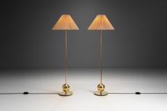  Tran s Stilarmatur AB Pair of AB Stilarmatur Tran s Brass Floor Lamps with Sphere Base Sweden 1960s - 3708751