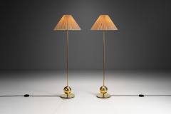  Tran s Stilarmatur AB Pair of AB Stilarmatur Tran s Brass Floor Lamps with Sphere Base Sweden 1960s - 3708753