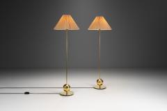  Tran s Stilarmatur AB Pair of AB Stilarmatur Tran s Brass Floor Lamps with Sphere Base Sweden 1960s - 3708755