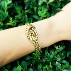  Van Cleef Arpels Van Cleef Arpels Hidden Watch Gold Knot Bracelet Circa 1960s - 181462