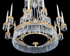  Werner Mieth A GERMAN NEOCLASSICAL SILVER AND GILT BRONZE TWELVE LIGHT CRYSTAL CHANDELIER - 3788041